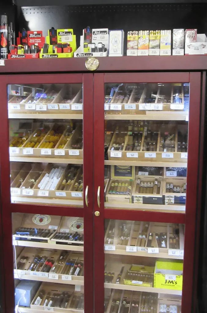 slide-cigar_750px Large humidor well stocked with cigars